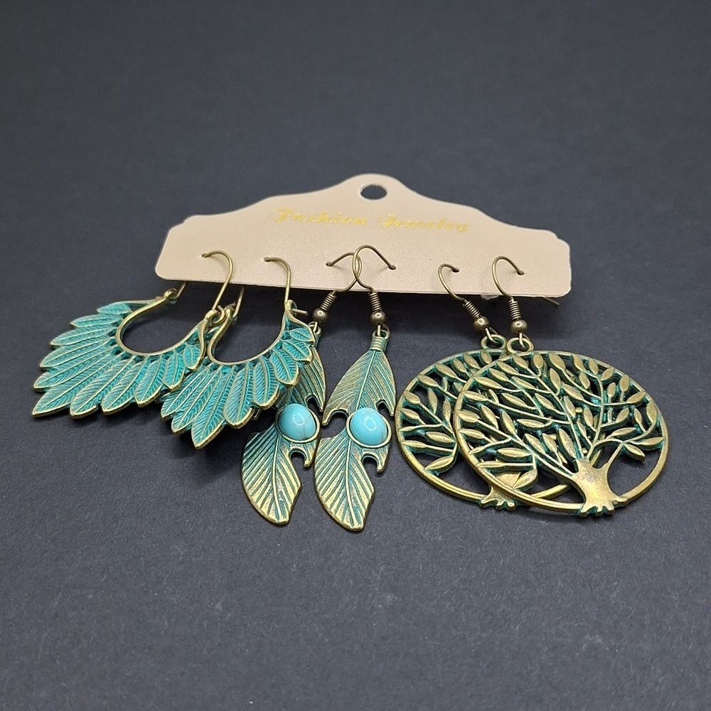Turquoise feather bronze earrings leaf  Boho jewel…